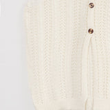 Moteriška megzta liemenė