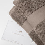 Rinkinys: medvilnės rankšluosčių rinkinys – (2 vnt, 70 x 140 cm) ir medvilnės rankšluosčių rinkinys – (2 vnt, 50 x 90 cm)